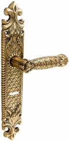 Brass door handles on the plank UNO BAROCCO STELLA 750 SAFE KEY