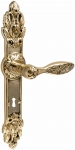 Brass door handles on the plank UNO BAROCCO BELLE 840 BB