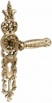 Brass door handles on the plank UNO BAROCCO GRANDE 750 PZ