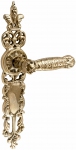 Brass door handles on the plank UNO BAROCCO GRANDE 750